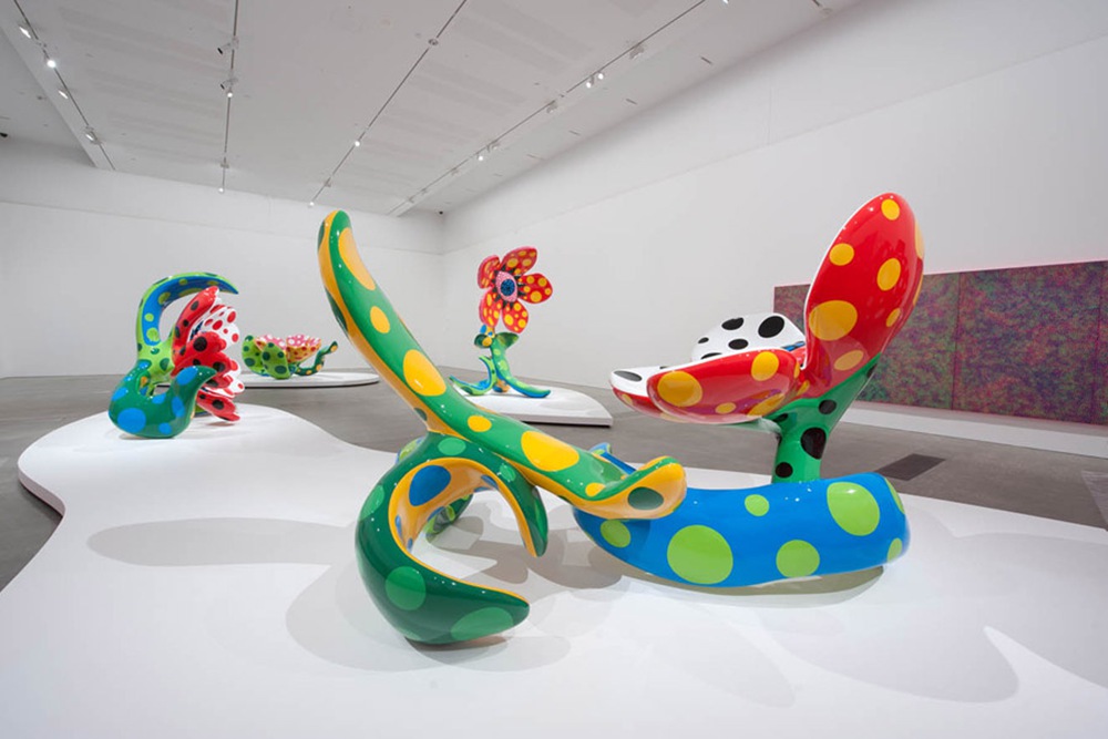 Flowers That Bloom at Midnight sculpture by Yayoi Kusama with polka-dot petals
