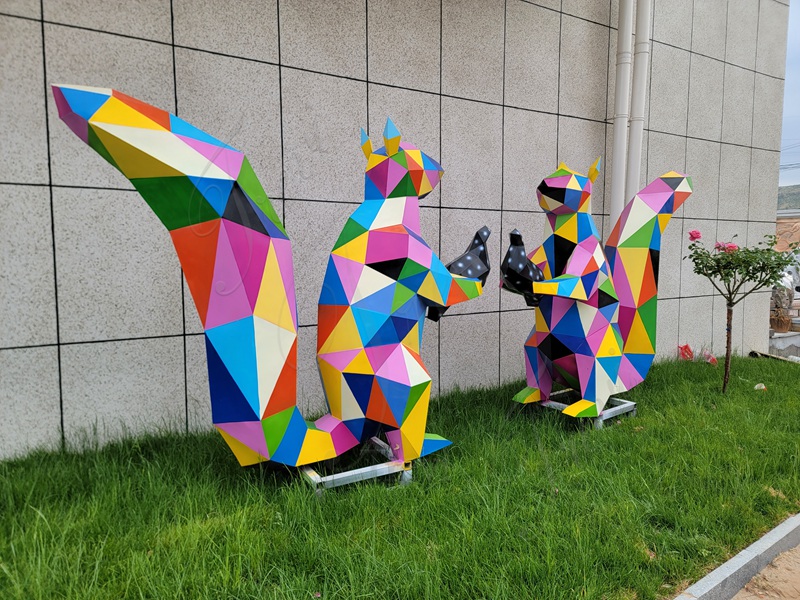 Colorful geometric squirrel sculptures