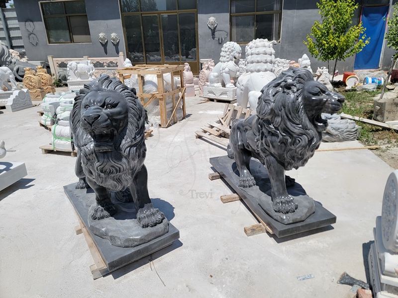 black stone lion statue