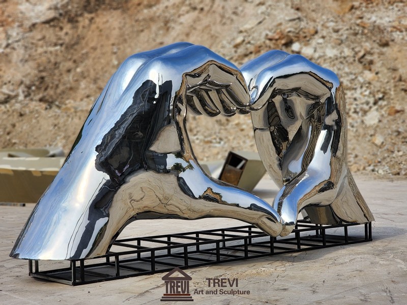 metal heart hand sculpture