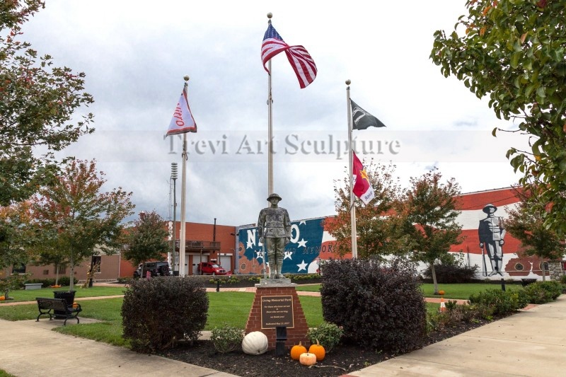 Completed bronze soldier statue installed at a memorial park