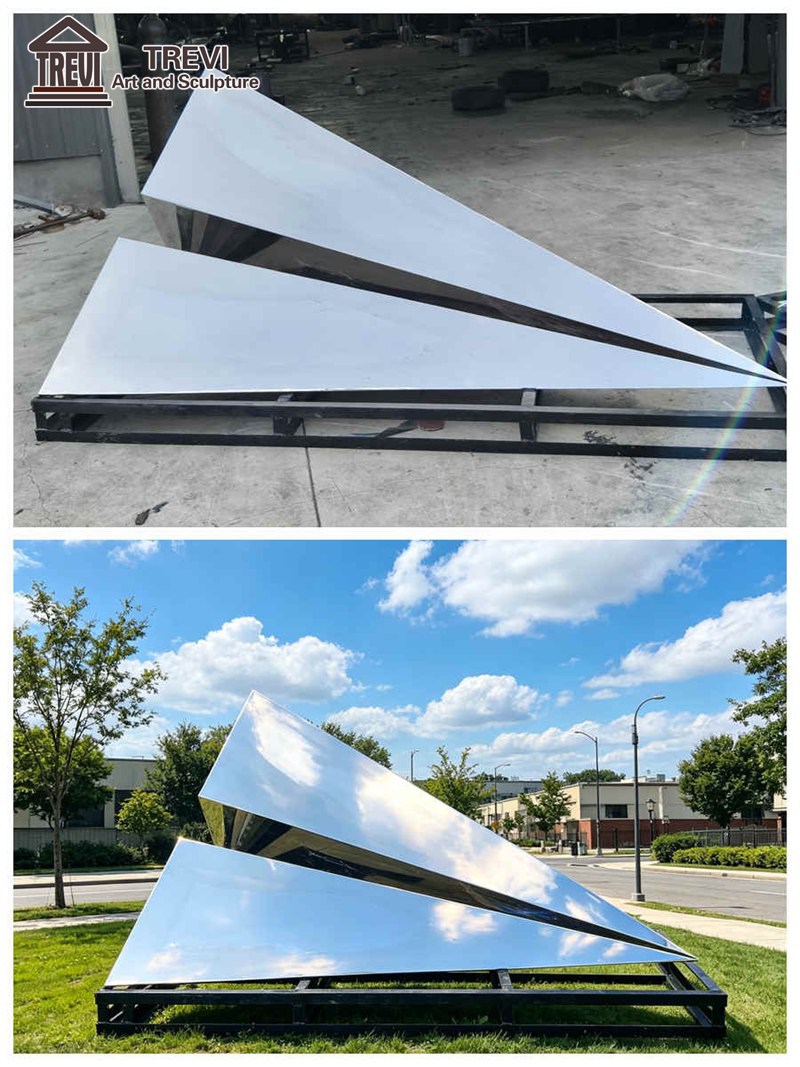 paper airplane sculpture outdoor placement