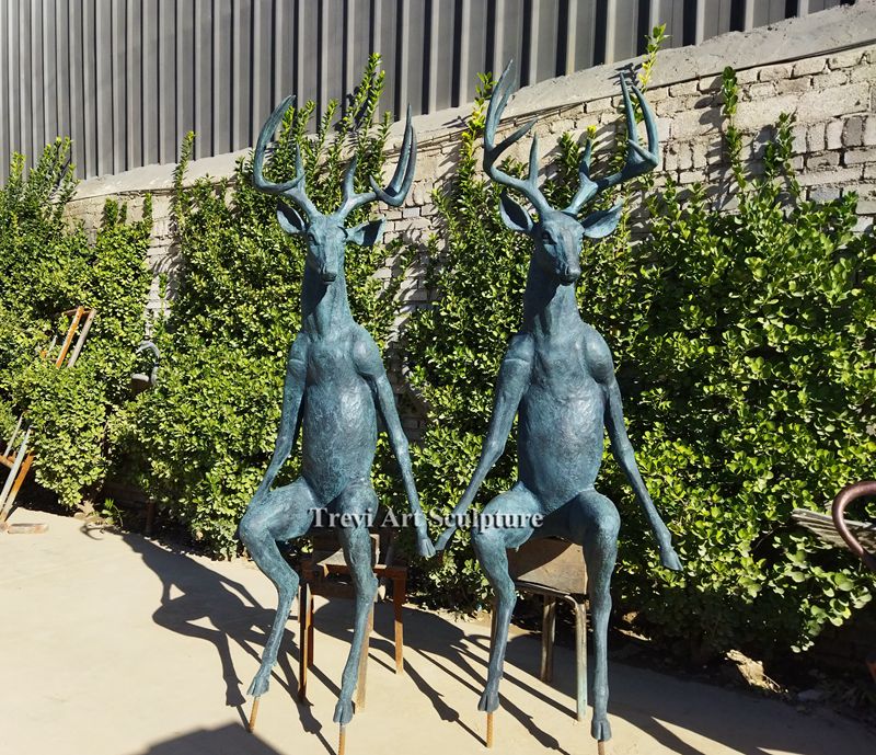 Life Size Scioto Lounge Deer Sitting bronze statue