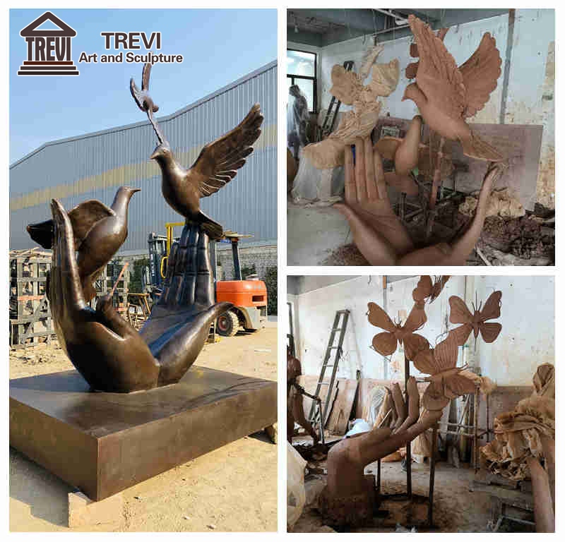 bronze hand and dove sculpture clay model