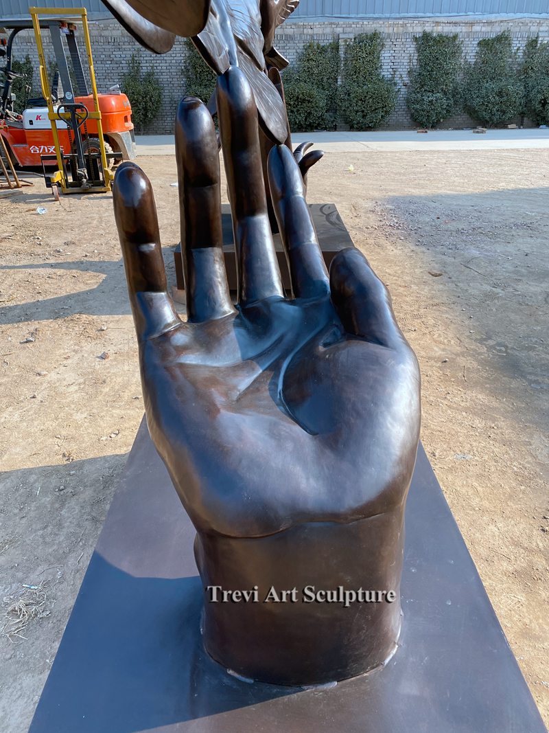 hand and Butterflies bronze sculpture
