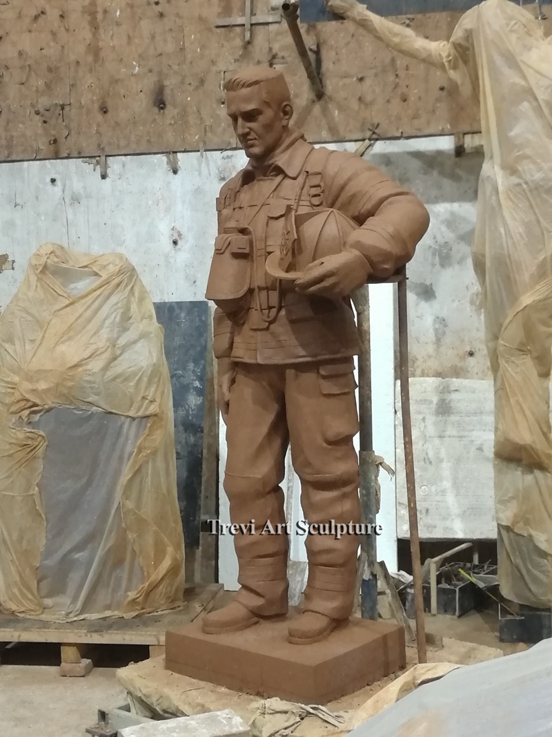 Standing-firefighter-statue-finished-clay-model
