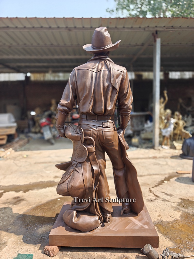 bronze cowboy statues