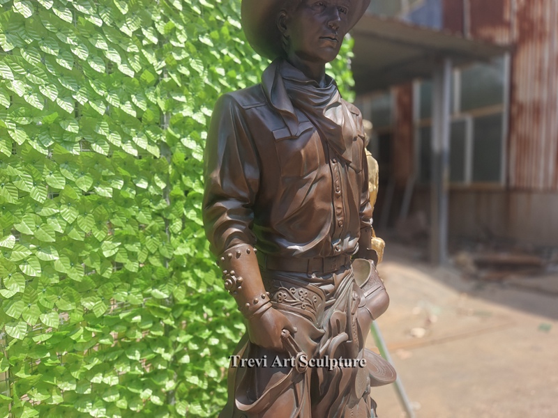 life size bronze cowboy statue details
