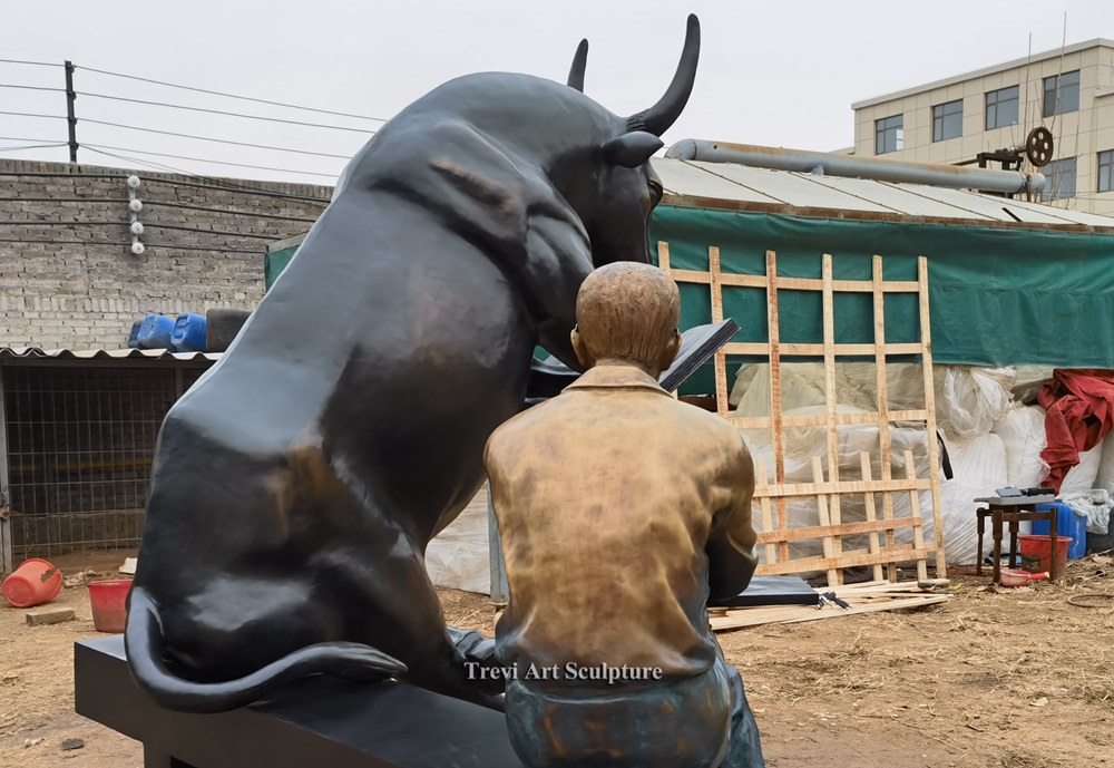 Outdoor bronze Man and reading cow sculpture