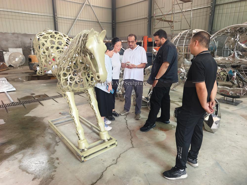 Client visits the sculpture factory