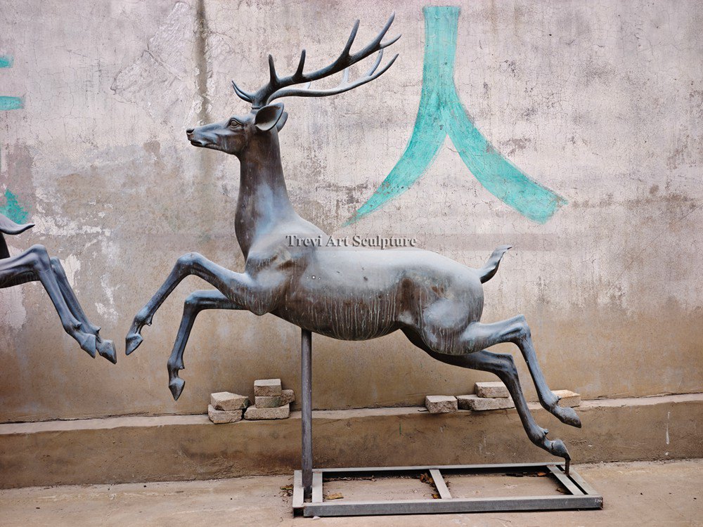 bronze running deer statue