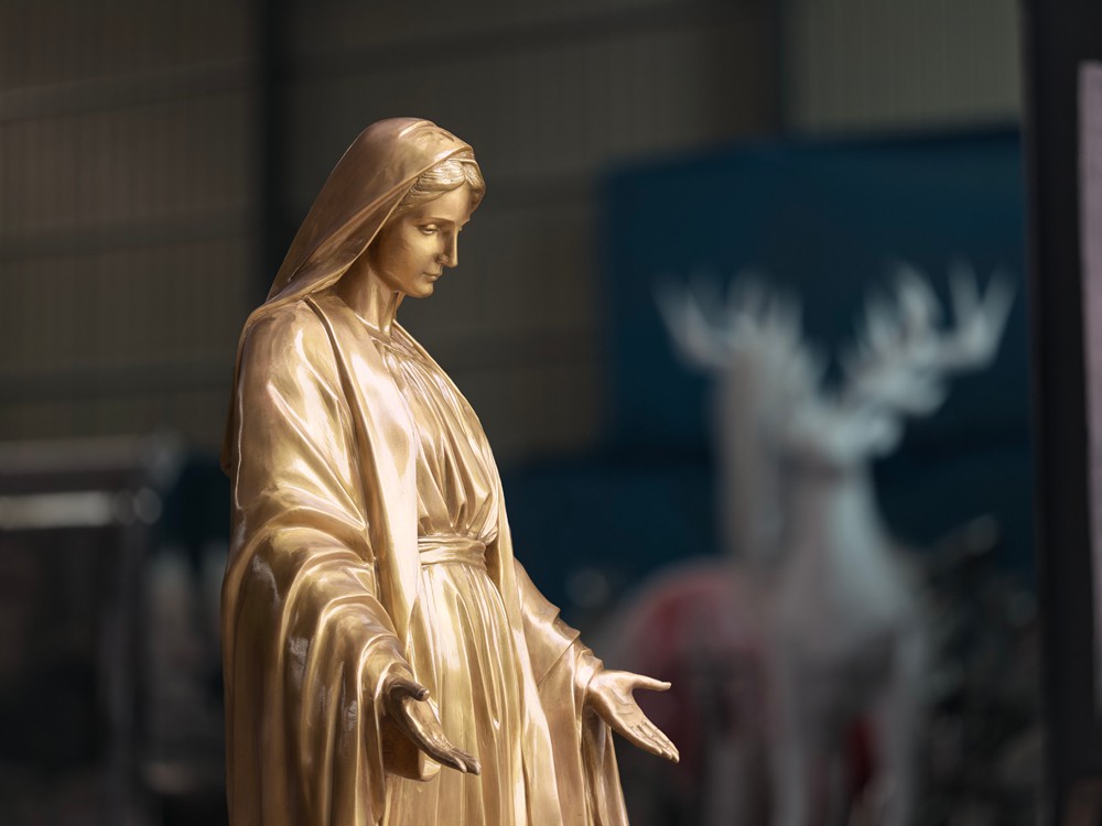 golden bronze Virgin Mary statue