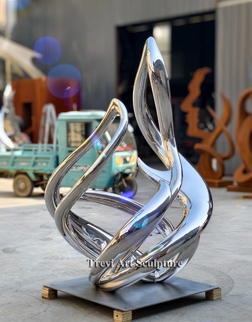 Mirror-Polished Stainless Steel Flame Sculpture