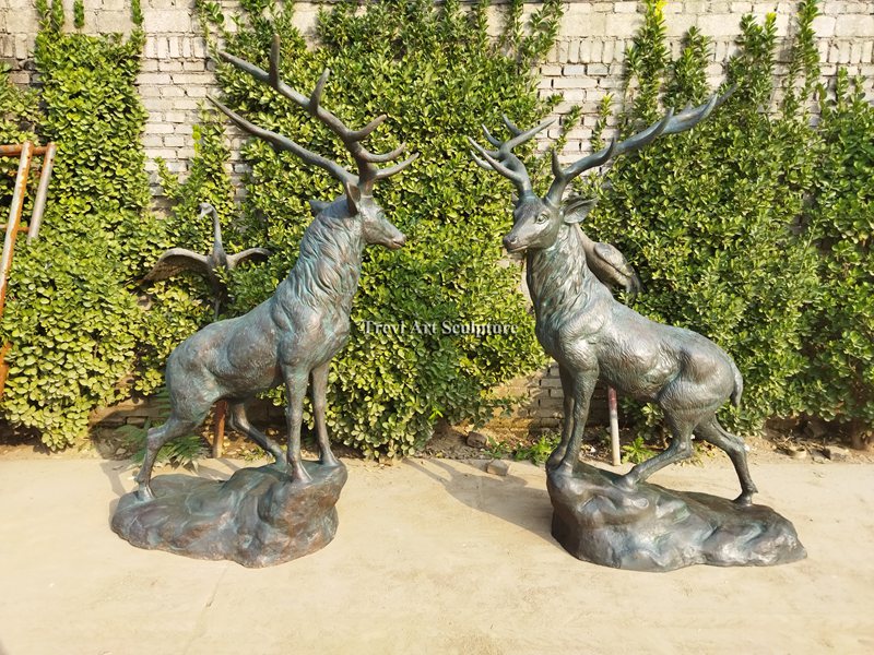 Matching pair of finished bronze stag statues