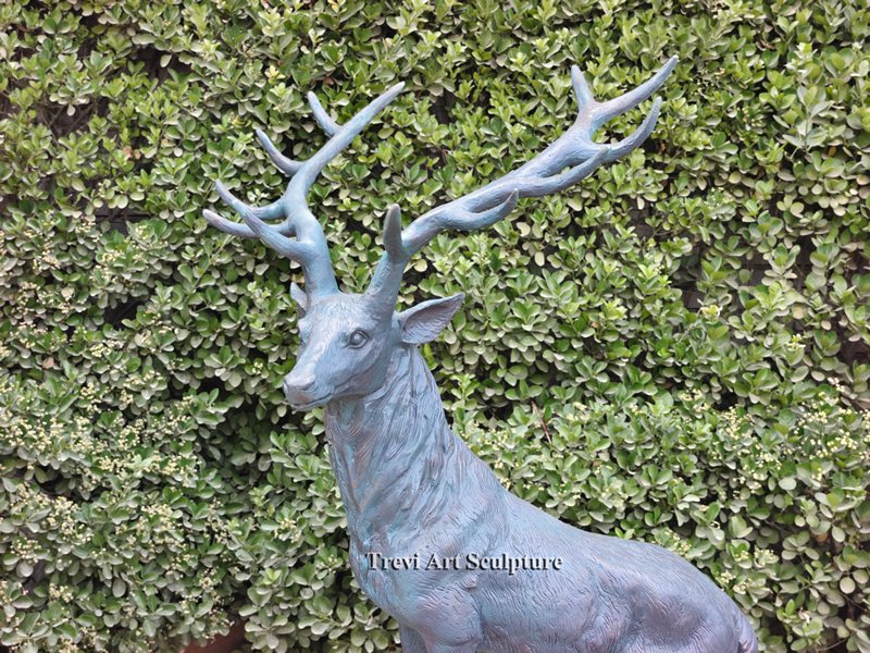 Bronze stag sculpture with antique verdigris patina