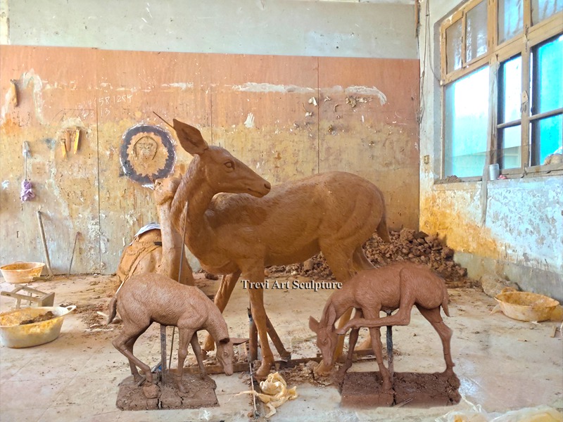 Clay model of a doe and fawn group