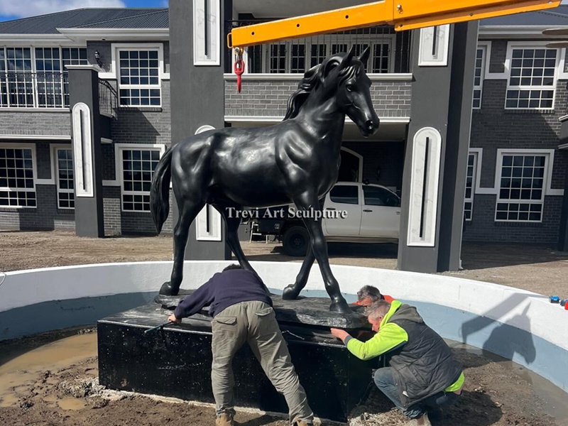 Life-size bronze horse sculptures shown in client installations