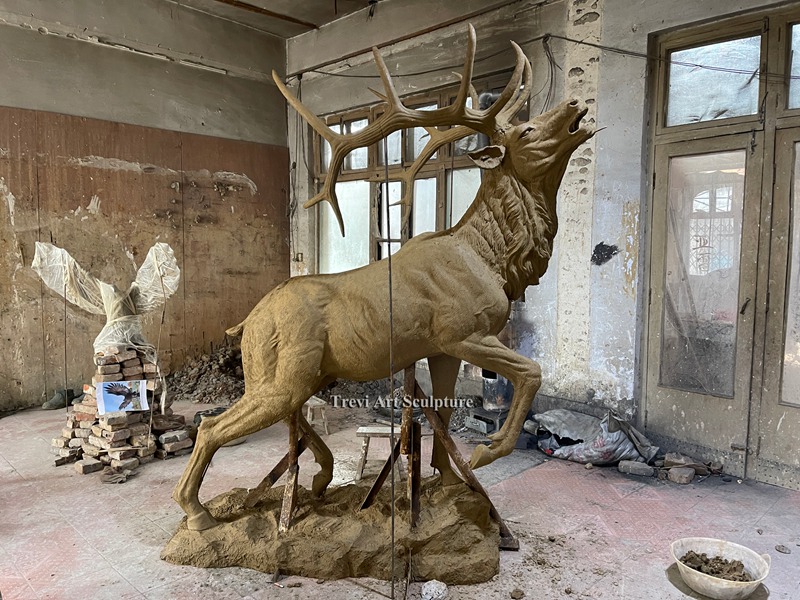 Hand-carved clay model for a bronze elk statue